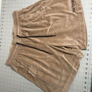 Native language velour shorts in latte large